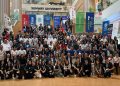 Group photo of attendees, sponsors, and speakers gathered on the grand staircase during the Internet Alliance Business Summit (IABS) 2026 at Sunway University, with IP ServerOne represented among the sponsoring partners.